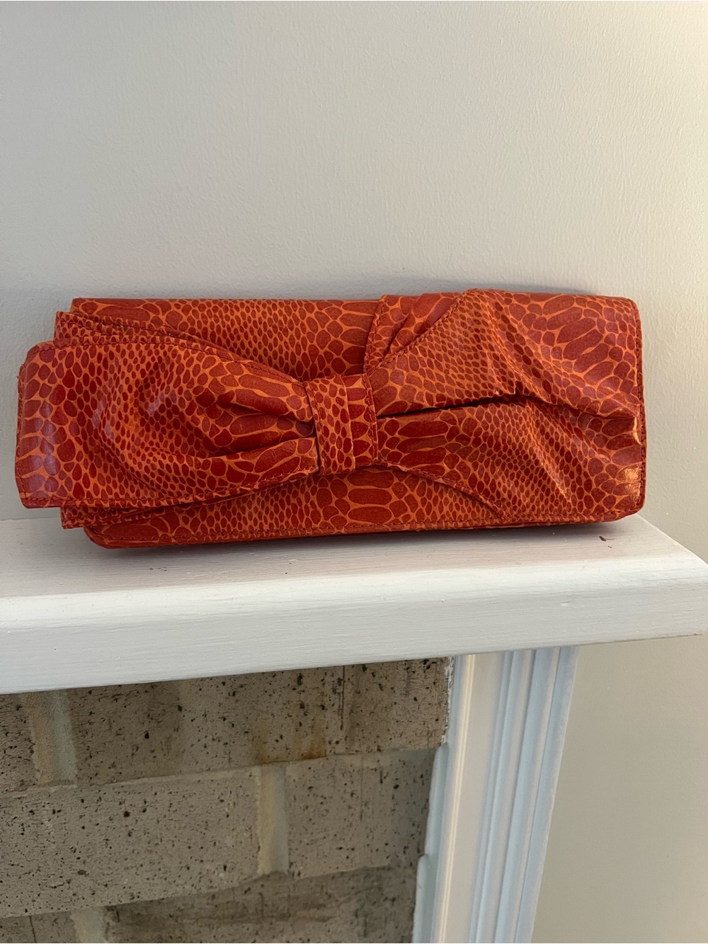 Nine West Orange Textured Bow Clutch